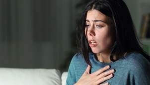 Person holding chest