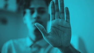 Man showing stop hand gesture