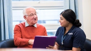 Man talking with a nurse