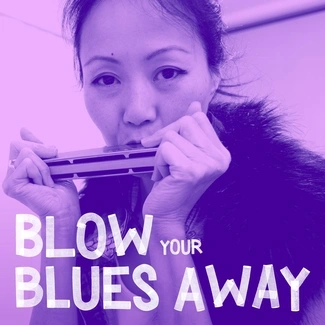 Woman playing harmonica