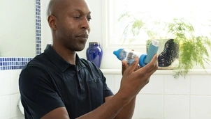 Man with inhaler