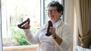 Lady holding weights