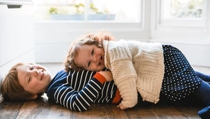 Two children lying down