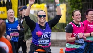Runner with arms in the air