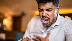 Man coughing
